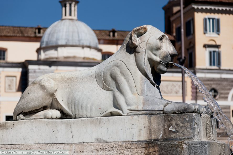 A lion statue in the Piazza del Popolo, Rome, Italy