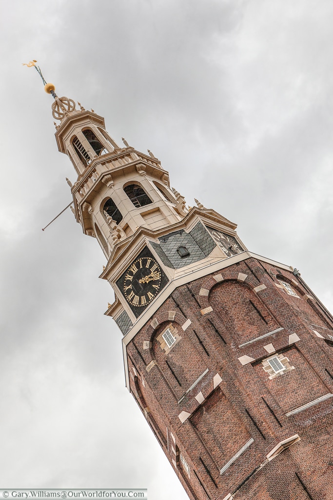 Montelbaanstoren - The imposing tower sits on the bank of the canal Oudeschans, Amsterdam, The Netherlands