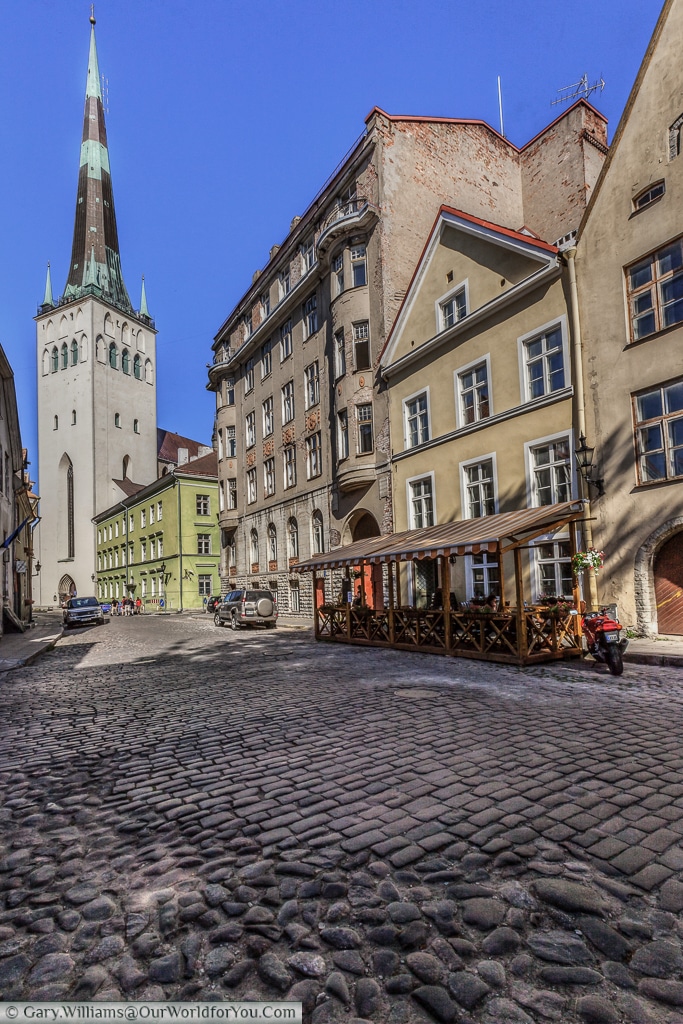 A view of St. Olav’s Church and Tower and the cobbled streets of Tallinn.