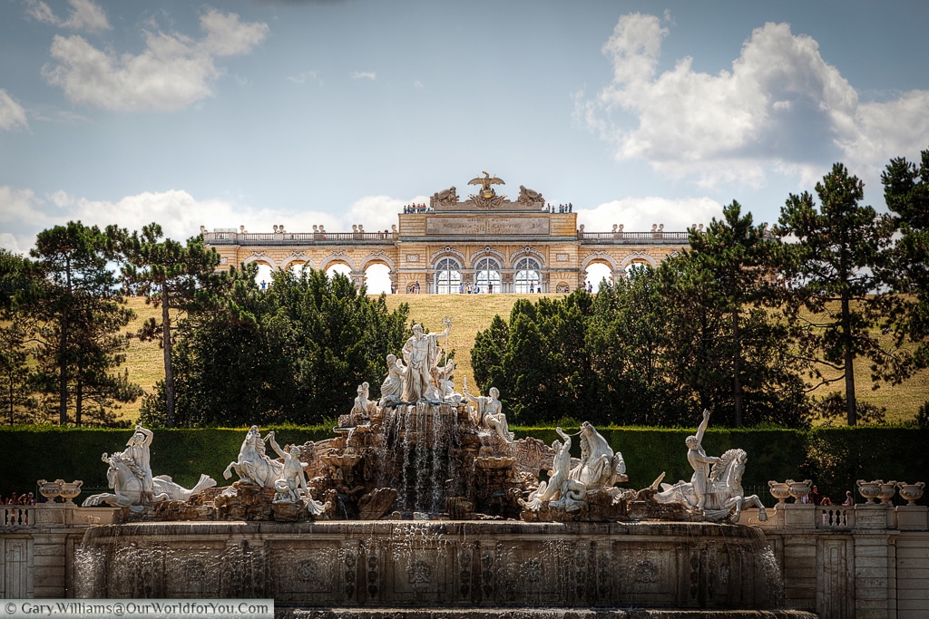 The Neptune fountain with the the Gloriette, in the background, on top of Schönbrunn hill.