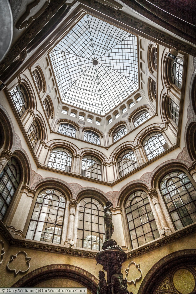 The dome above the Donaunixen in the Freyung Passage , Vienna, Austria