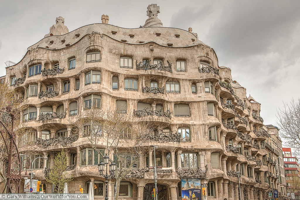 The view of the Casa Milà from the intersection of Passeig de Gràcia & Carrer de Provença, Barcelona, Spain
