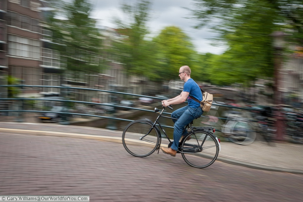 A cyclist, Amsterdam, The Netherlands