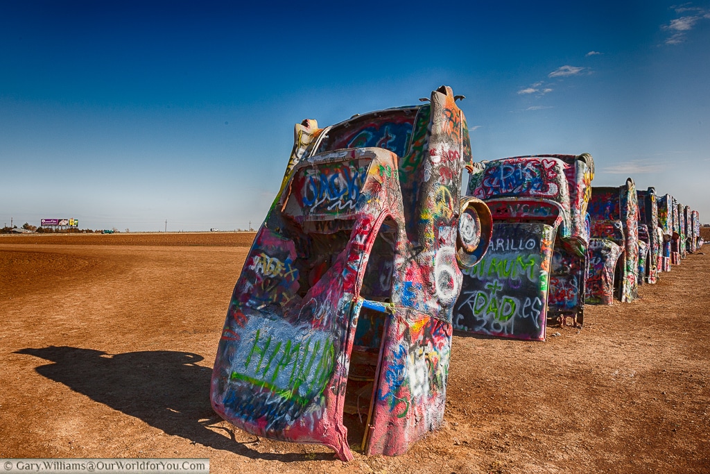 All the cars lined up at the Cadillac Ranch, Amarillo, Texas