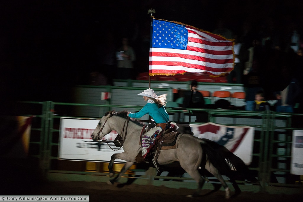 The Stars & Stripes being proudly flowin in the Stockyards Championship Rodeo, Fort Worth, Texas