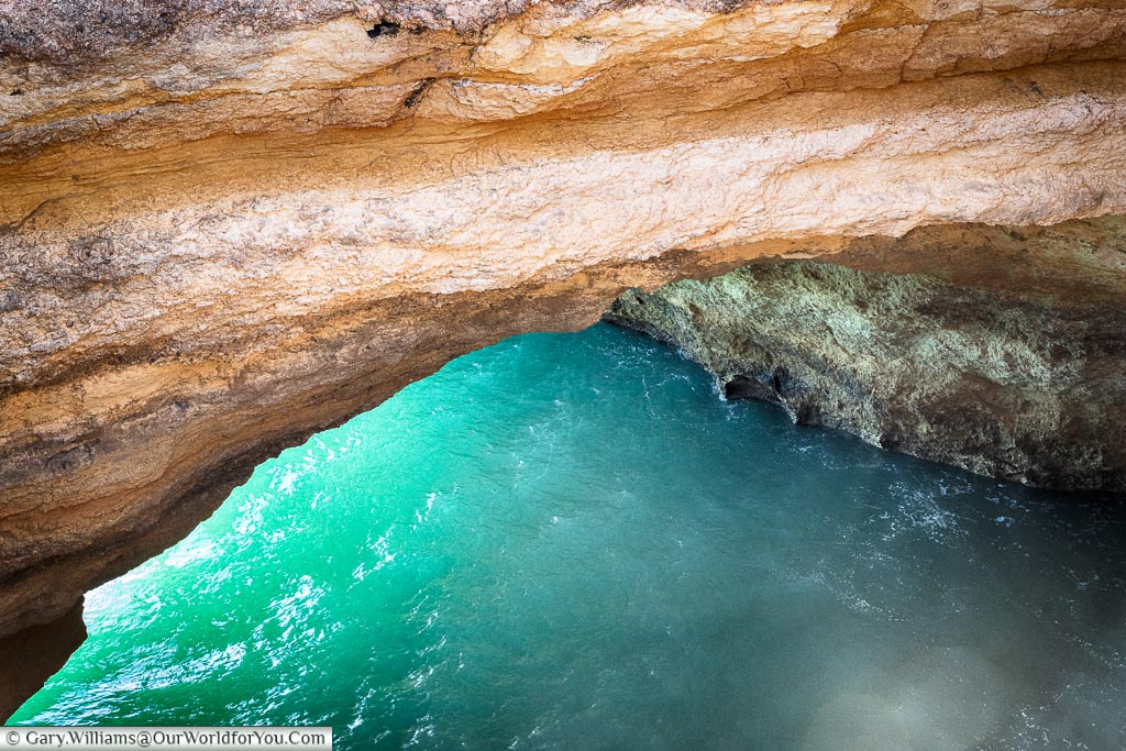 Secret caverns at praia de Benagil, Algarve, Portugal
