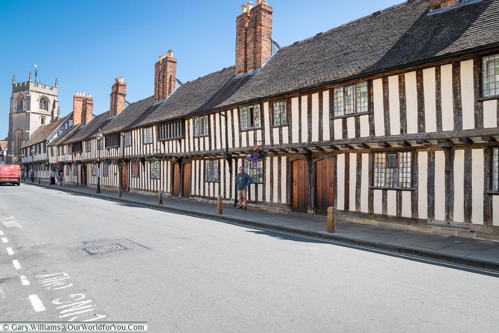 A row of timber-framed Almshouses, Shakespeares Schoolroom & Guildhall on Henley Street in Stratford-upon-Avon