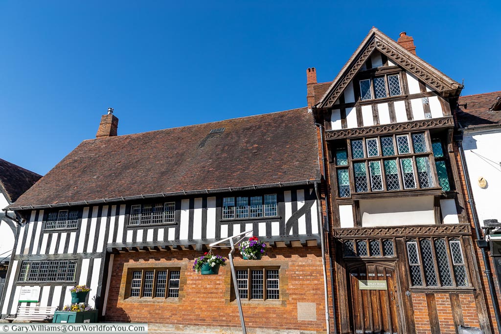 The half-timbered Library and Registry Office in Stratford-upon-Avon, Warwickshire under be deep blue sky