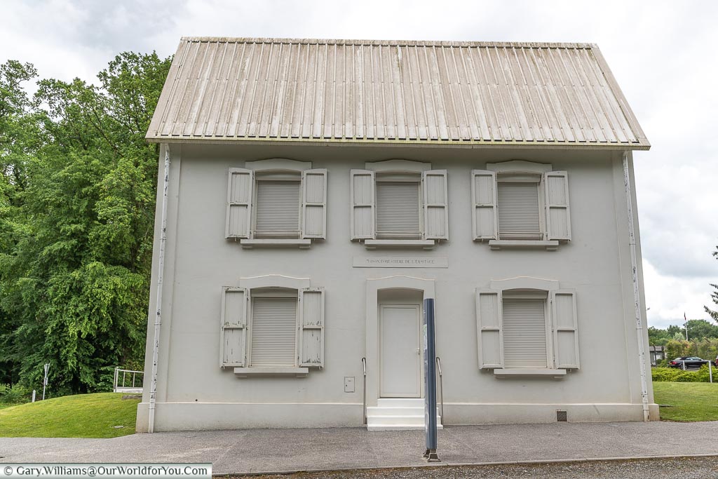 The Forester's House, painted in a drab grey, in Pommereuil, France
