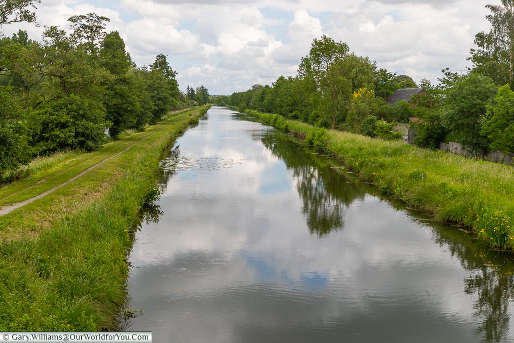 The long straight still Sambre–Oise Canal in Ors, France