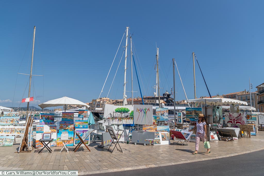 Artists along the quayside, St Tropez, France