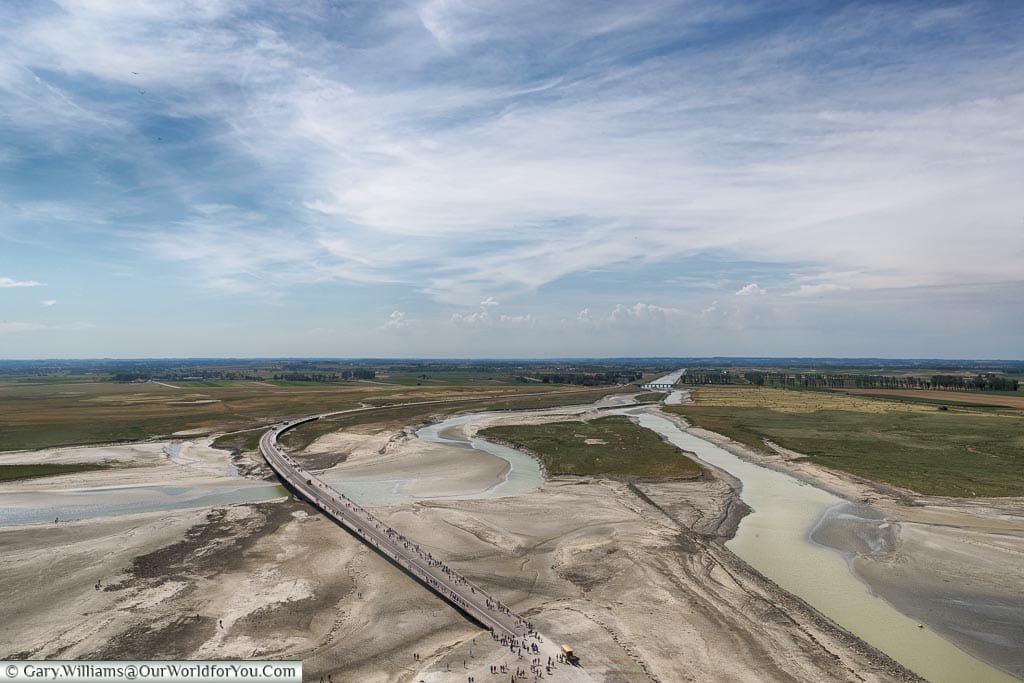 The view of the causeway, and the sandy shores, from the top of Mont-Saint-Michel