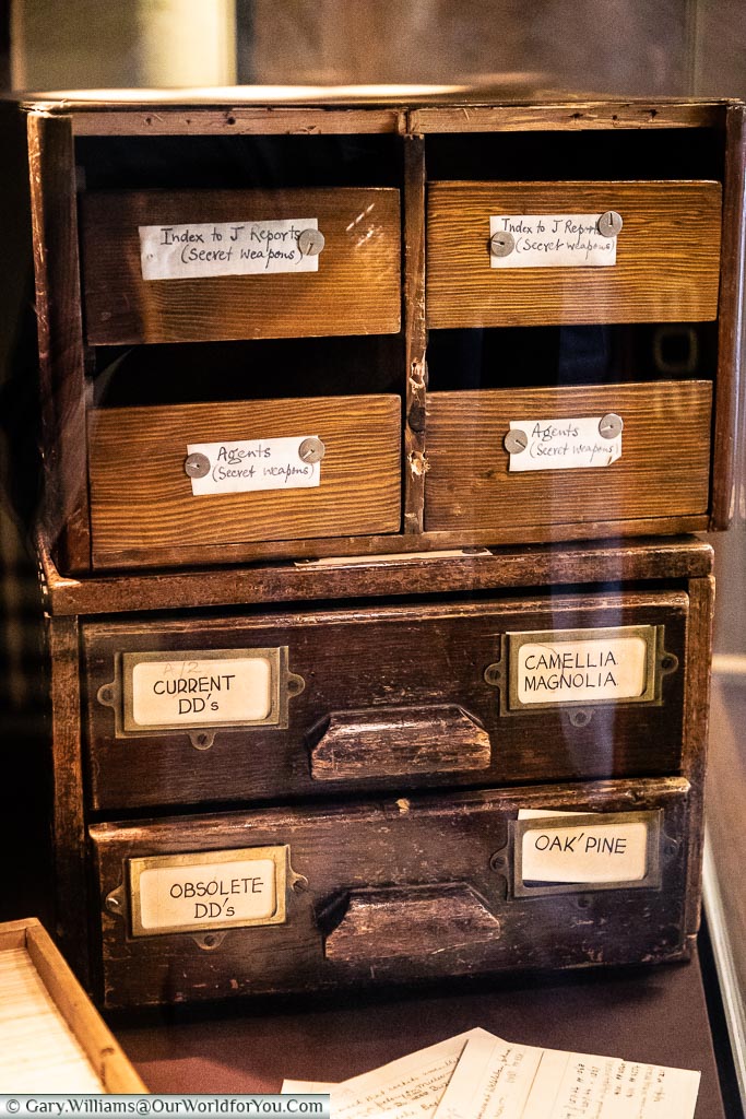 A set of small wooden filing drawers from the operational days of Bletchley Park