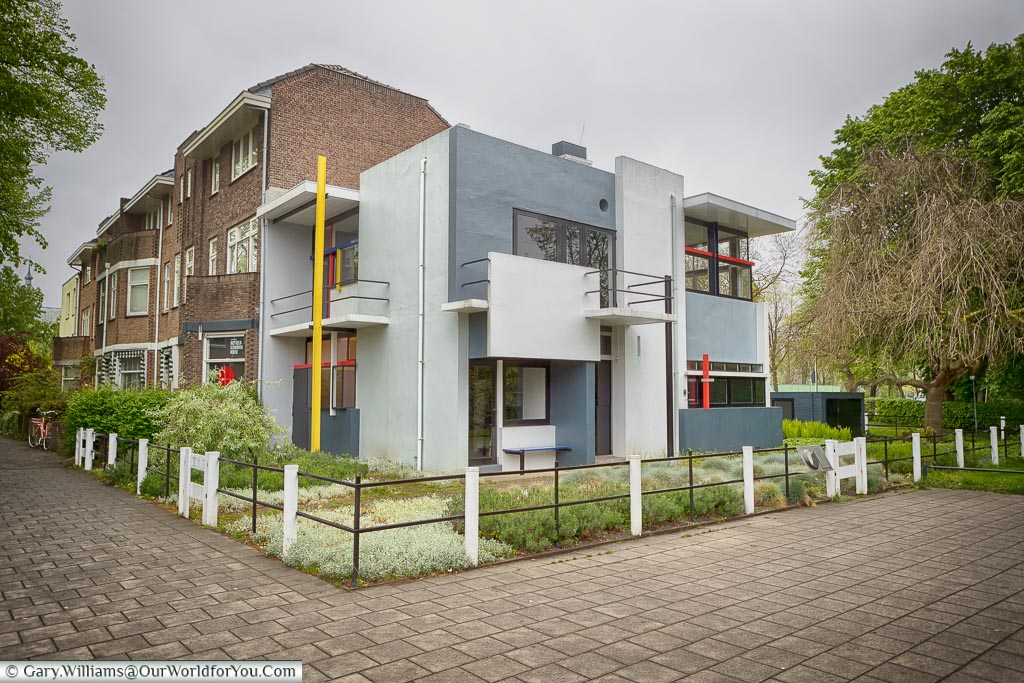 The stylist cubist house, known as 'Rietveld Schröder House', in two shades of grey, trimmed with red & yellow features