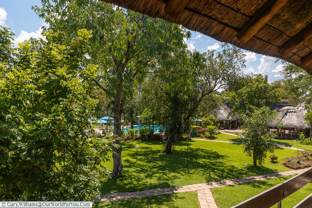 The view over the grounds of the A’Zambezi River Lodge from the thatch covered balcony of our accommodation in Victoria Falls, Zimbabwe