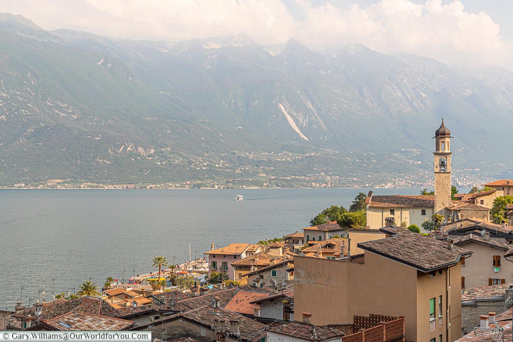 Looking over the rooftops of Limone sul Garda with the mountains in the background.