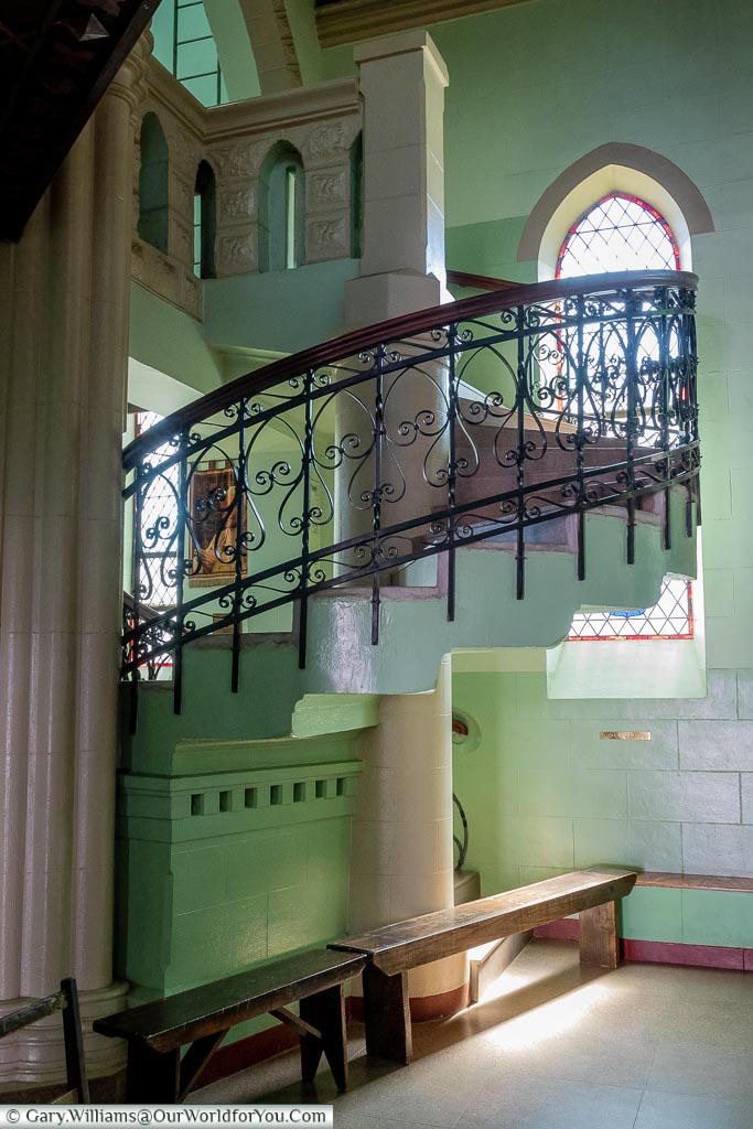 A spiral staircase at the back of the Sacred Heart Cathedral that leads to the organ.