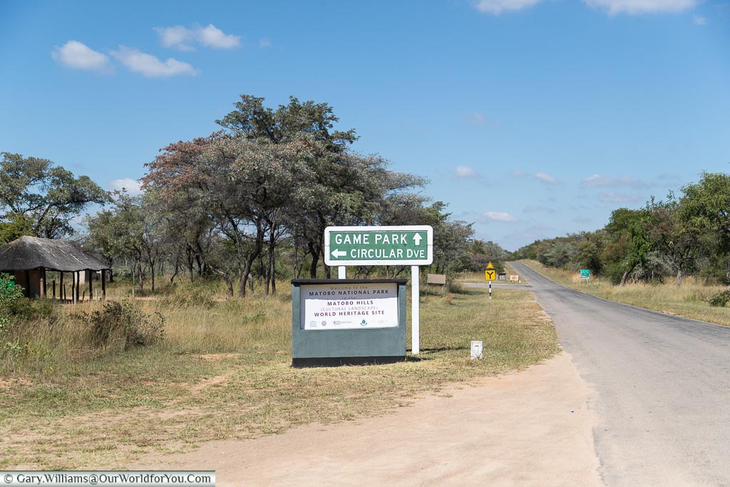 A sign within the entrance to the Matobo National Park with a route for the Game Drive and another for the Circular Drive.