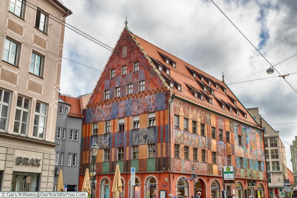 The colourful Weavers House decorated with murals on the outside, now home to shops.