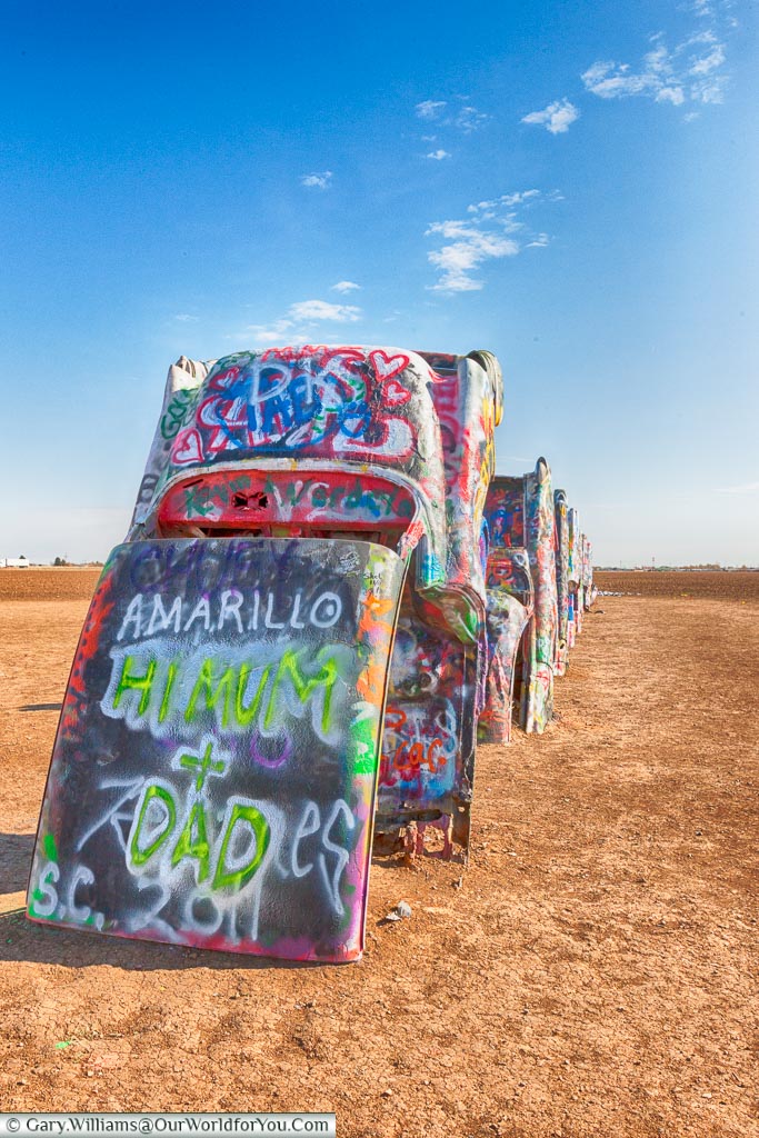 A postcard to loved ones at the Cadillac Ranch