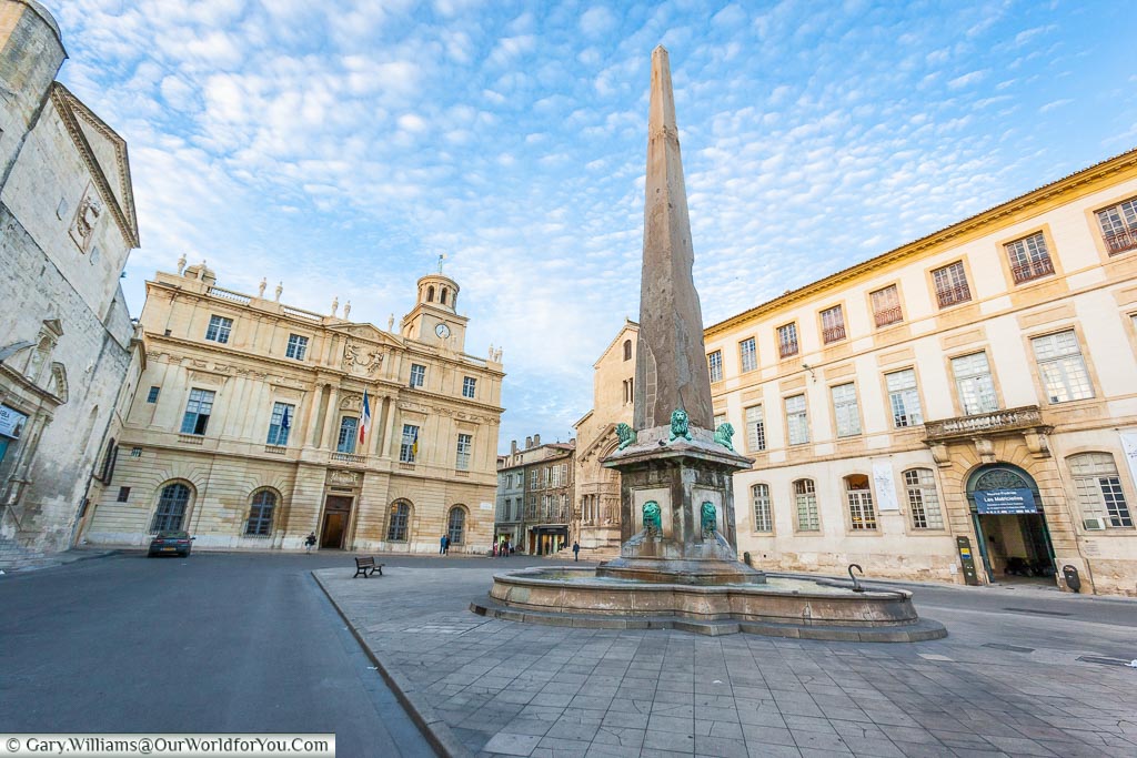 An obelisk & fountain in the Place de la Republique of the historic Roman city of Arles.