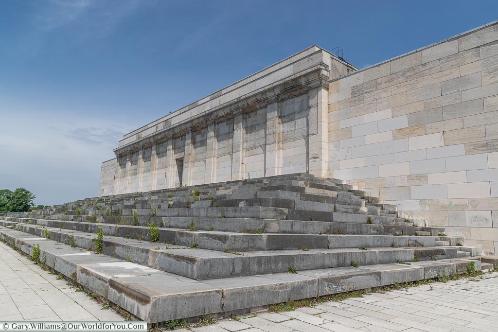 At the top of the Nazi Party Zeppelinfeld Grandstand looking toward the back with the final set of steps before the neoclassical facade.
