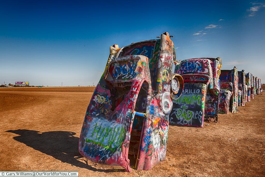 All the cars lined up at the Cadillac Ranch
