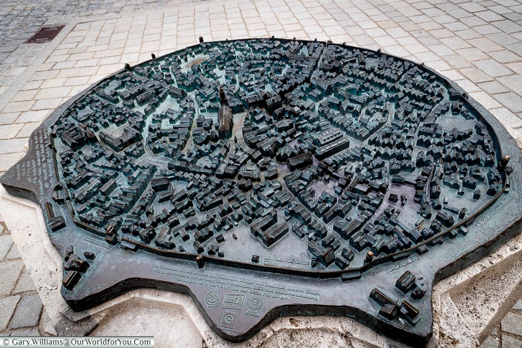 A brass tactile town map of the old town inside the city walls.