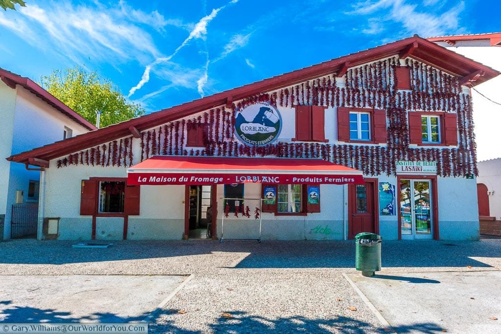 The front of a cheese shop in Espelette, decorated in a mass of red dried Peppers for which the town is famous for.