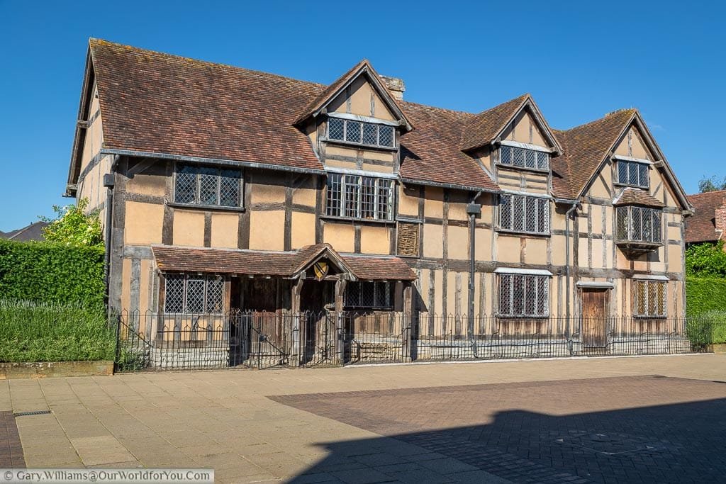 Shakespeare's house in the centre of Stratford upon Avon. The beige coloured half-timbered Tudor home stands now was a museum to the playwright's legacy.