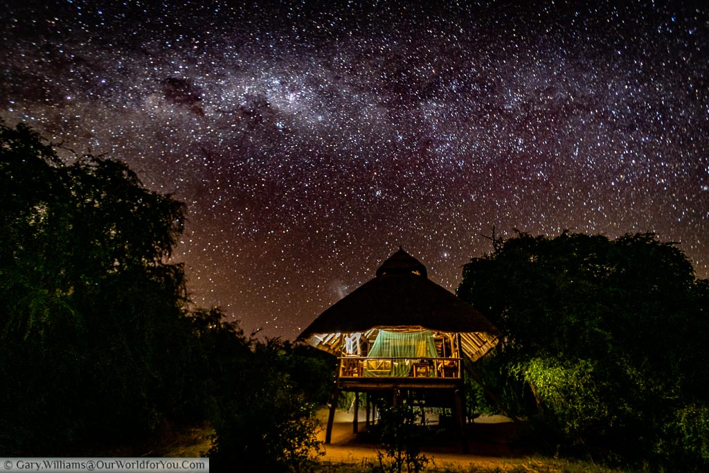 The lodge, under a full African night sky.