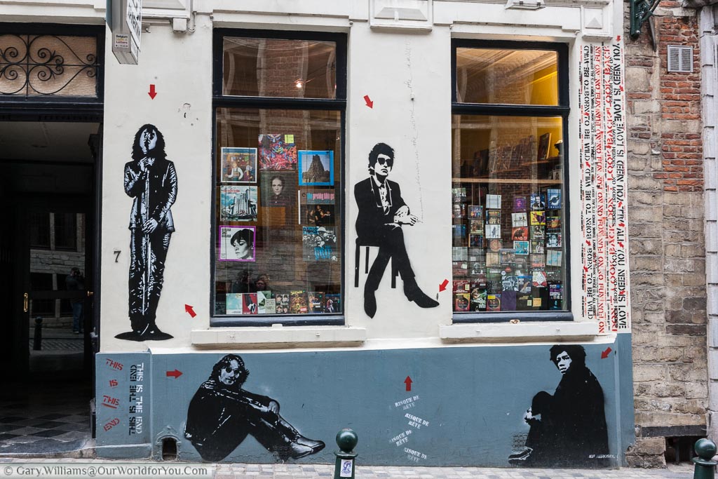 A collection of musical legends stencilled on the front of the Arelquin Record Store in Brussels by the street artist Jef Aérosol.