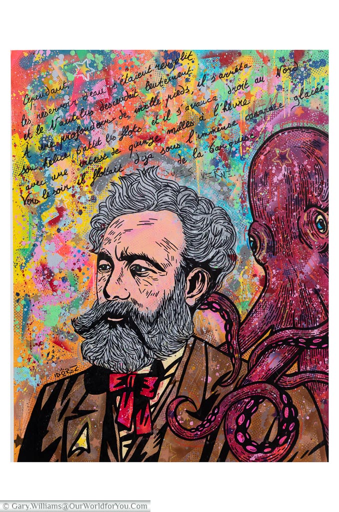 A multicoloured mural of Jules Vernes and a octopus from twenty Thousand Leagues Under the Sea at his home in Amiens, France