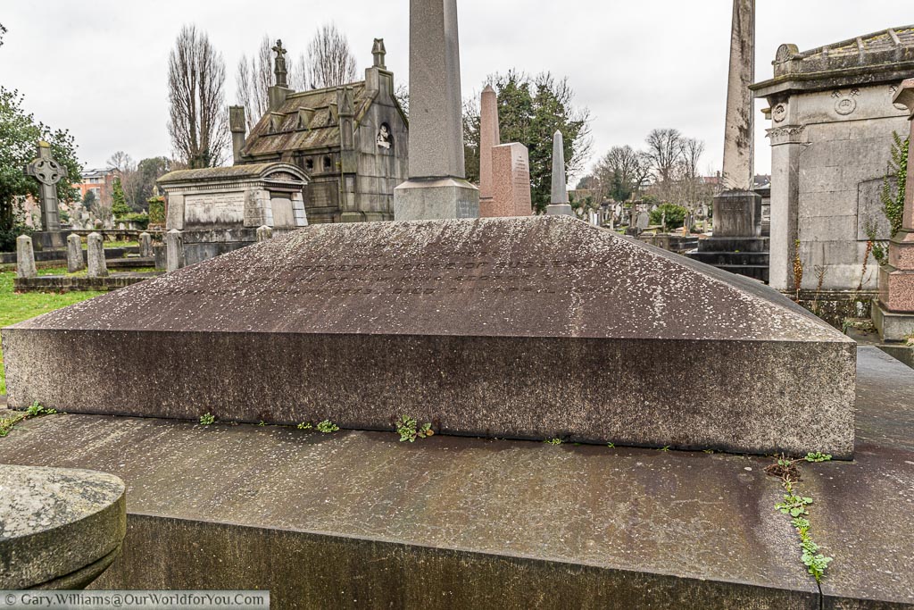 A weathered grey granite tomb of Prince Augustus Frederick, Duke of Sussex and son of King George III.