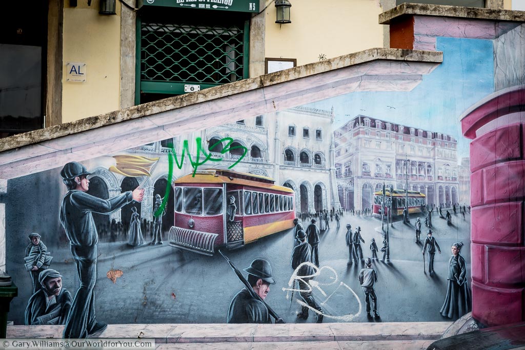 A piece of street art depicting a tram guard waving on Lisbon's city trams in a  typical scene