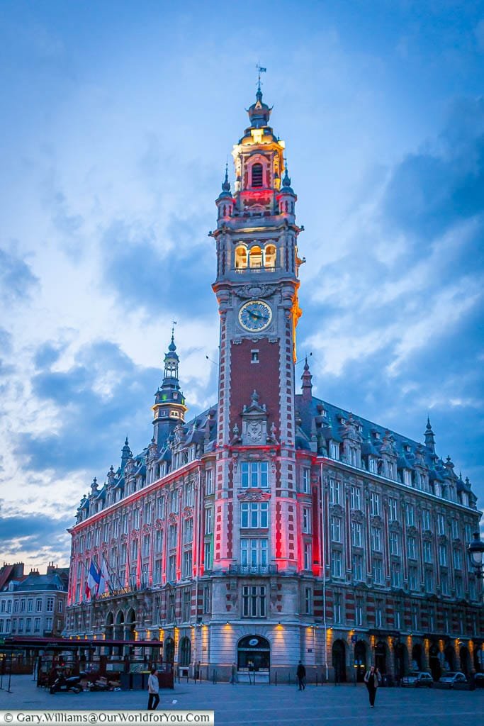 The Belfry of the Chamber of Commerce in Lille at dusk.