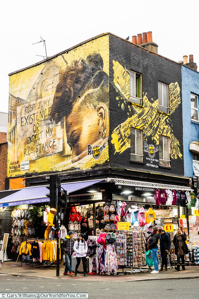 A mural for Dr Martens boots above a gift shop on the corner of Camden High Street and Jamestown Street.