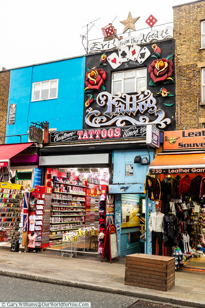 The ornate facade for 'Evil from the Needle', Tattooist, above a gift shop in Camden