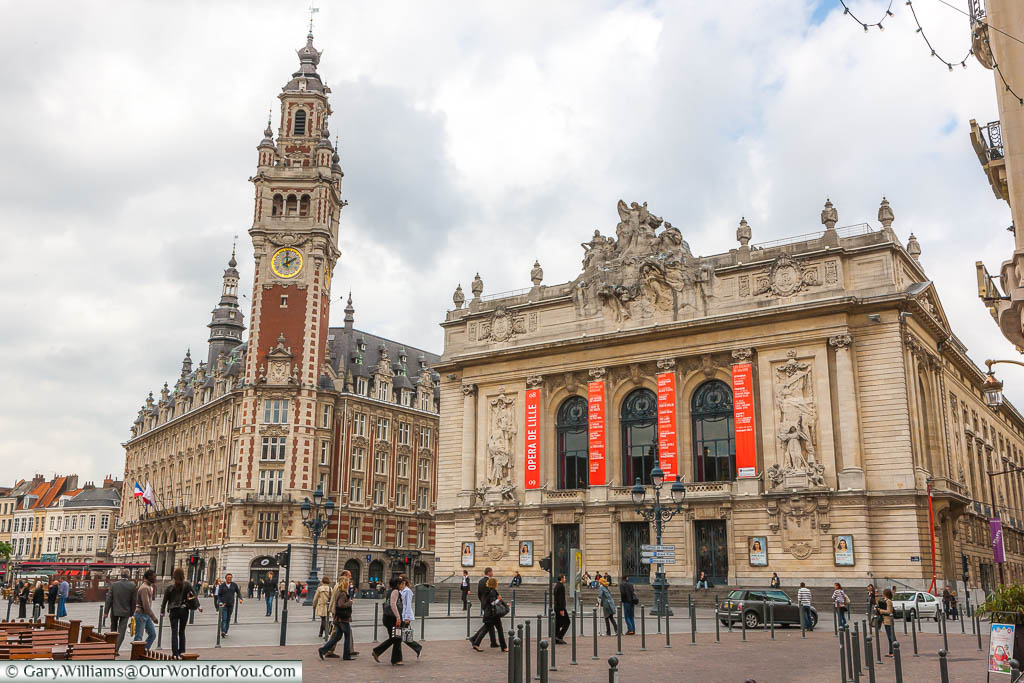 The Opéra de Lille in Place du Théâtre next to Belfry of the Chamber of Commerce in Lille.