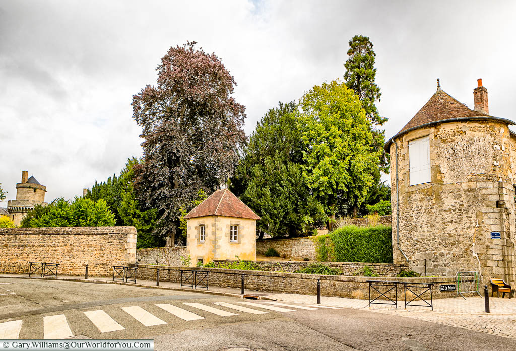 The ramparts and stone wall that would have once marked the edge of old Alençon, Normandy.