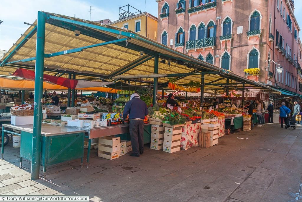 A fruit and vegetable stall at the Mercato di Rialto, Venice, Italy