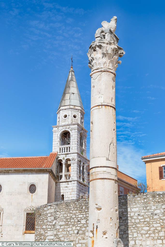 The Roman ‘Pillar of Shame’ in the Roman Forum of Zadar, with the Venetian Bell Tower in the background
