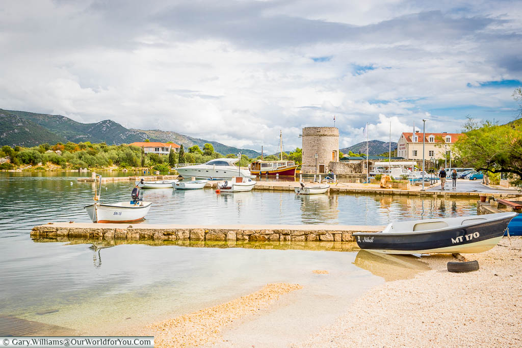 Small boats in the quaint harbour of Ston in Croatia