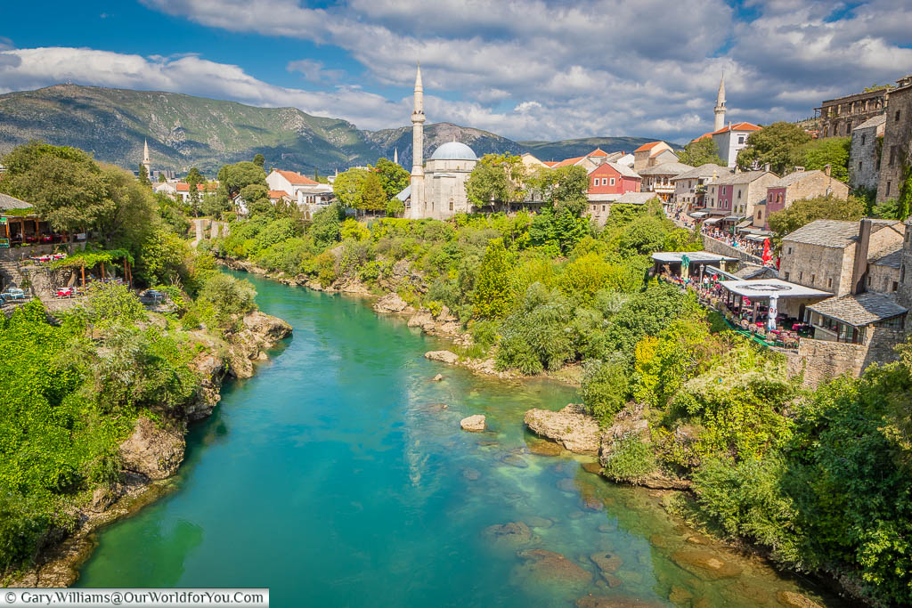 Looking along the Neretva River from the Stari Most in Mostar as we take a detour into Bosnia and Herzegovina on our Croatian Road Trip