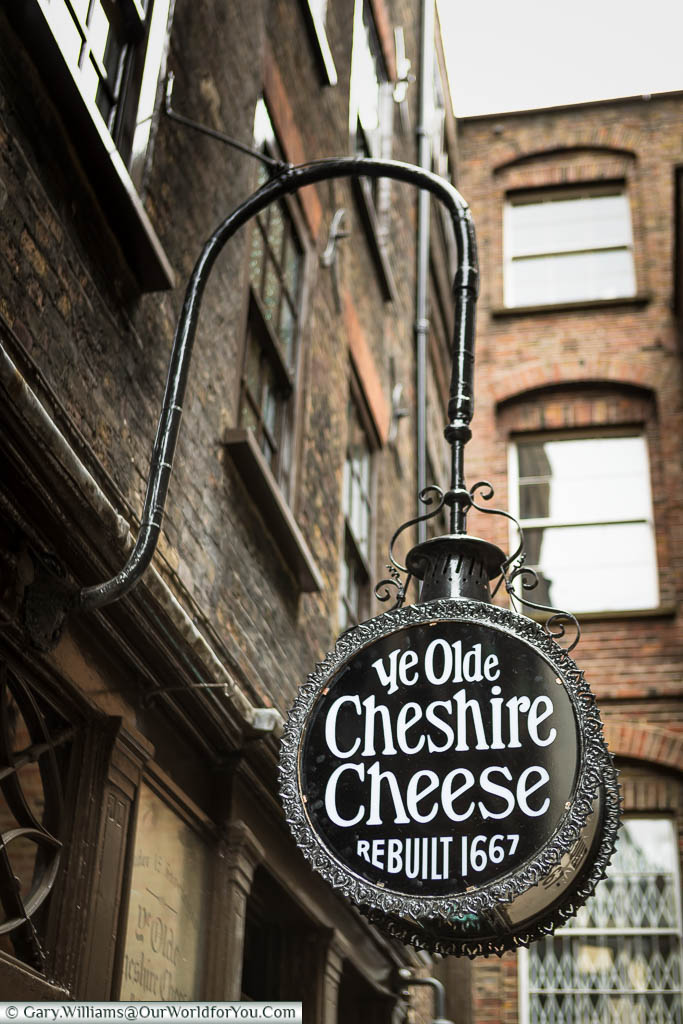 A sign to the Ye Olde Cheshire Cheese public house stating it was rebuilt in 1667 (After the Great fire of London)