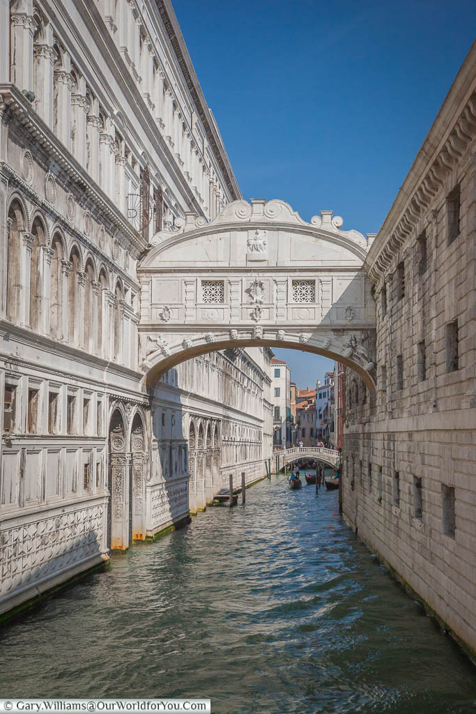 The white stone 'Bridge of Sighs', over a canal, connecting the Doge’ Palace with the New Prison.