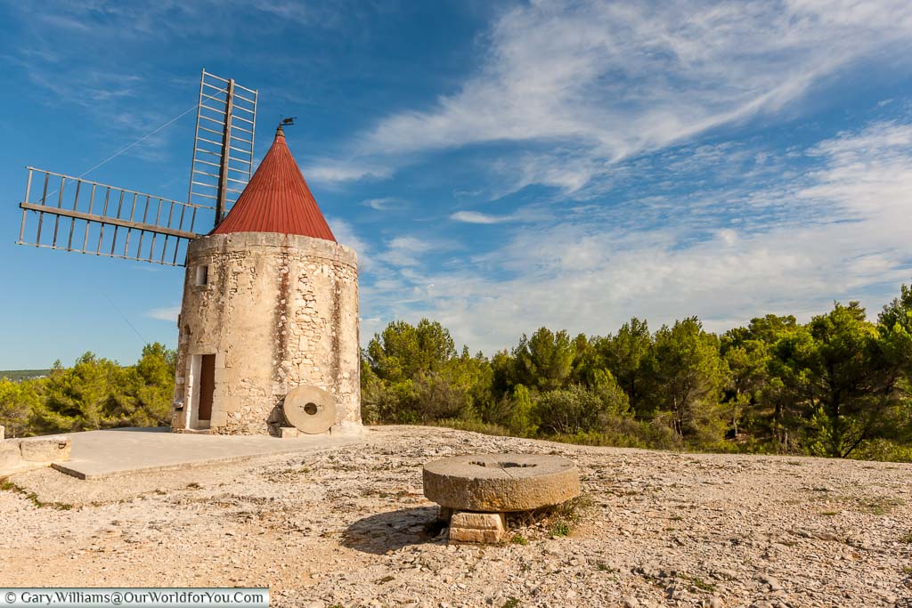 A traditional stone windmill in Provence, France