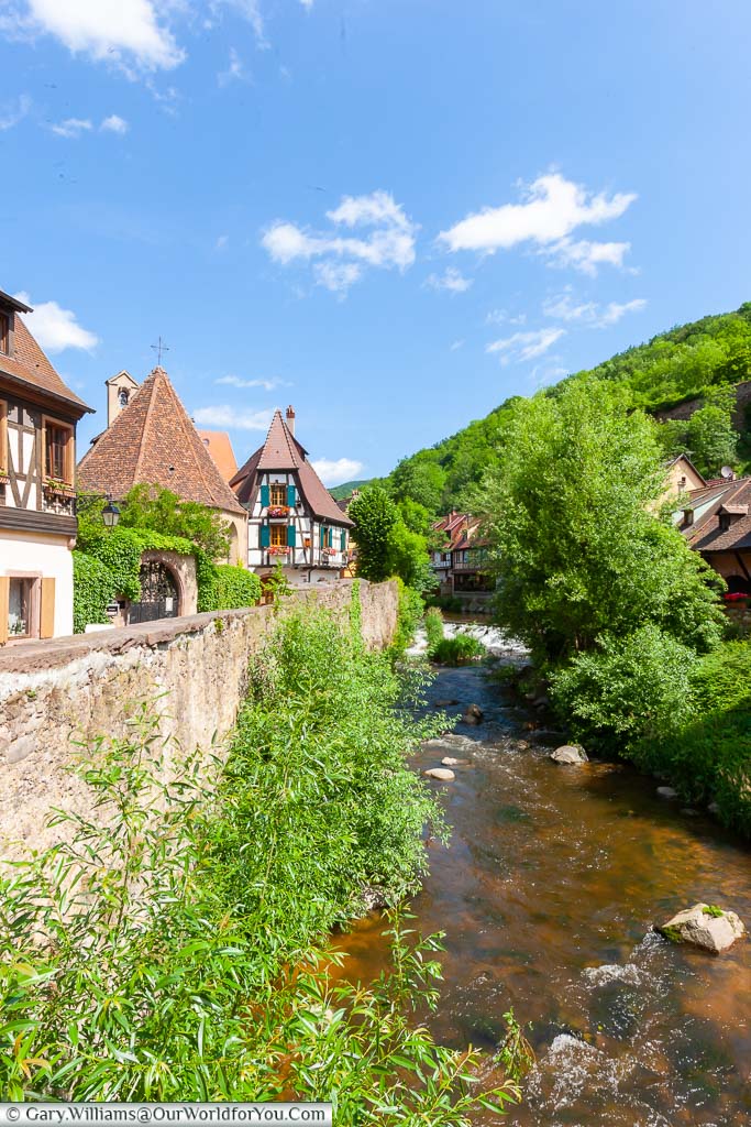 The view along the River Weiss on the edge of Kaysersberg in the Alsace region of France