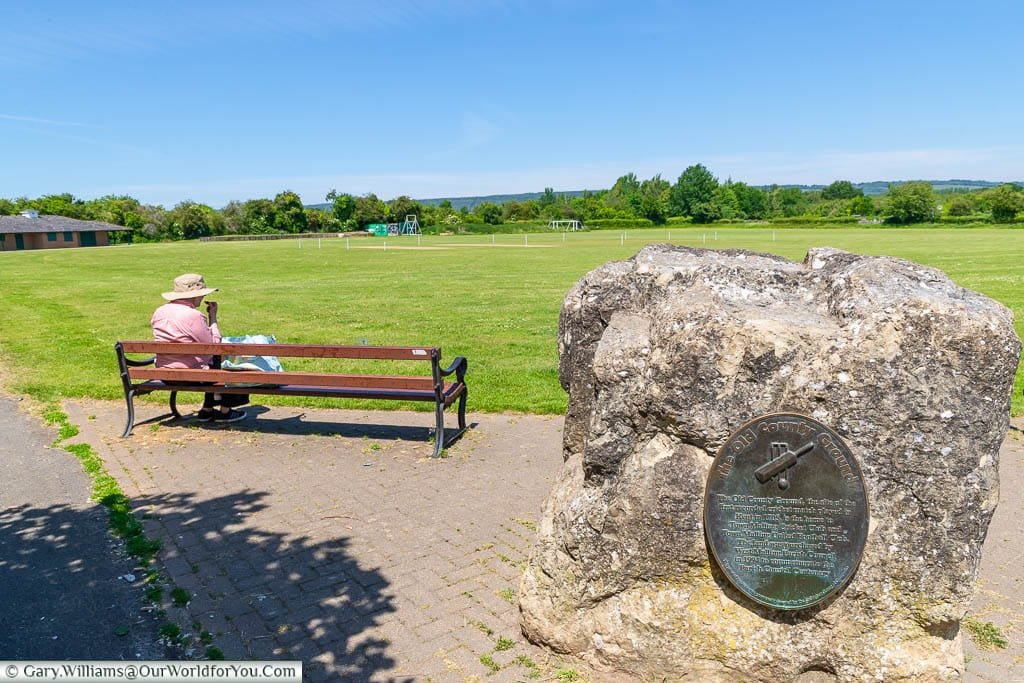 Overlooking the West Malling cricket ground with a stone & plaque commenting its place in history