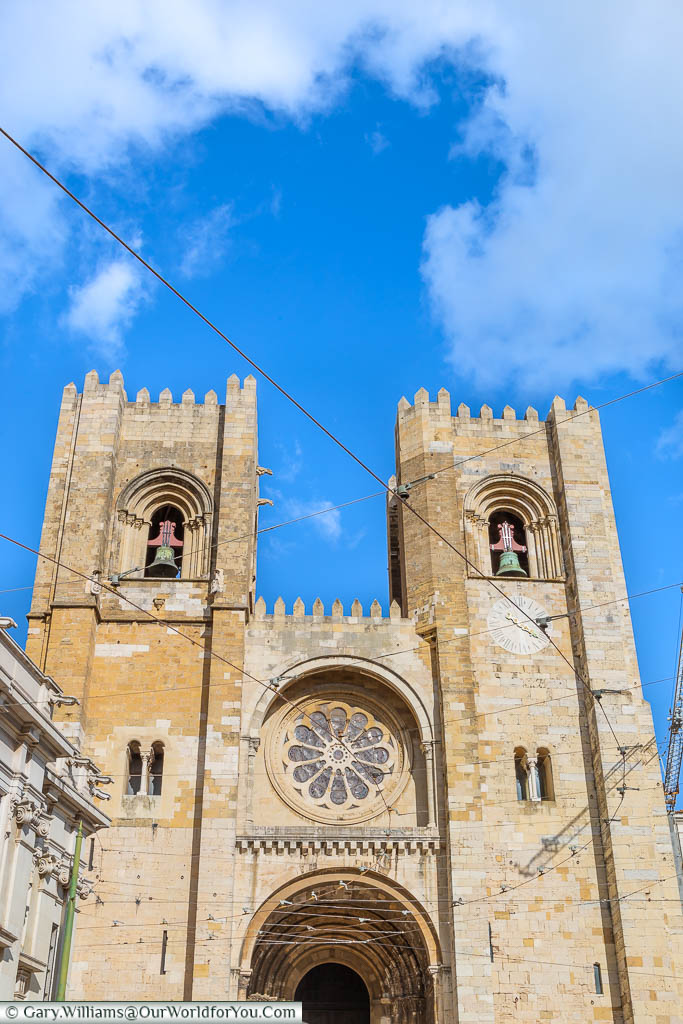 The two stone towers flanking the entrance to Sé Cathedral in Lisbon, Portugal